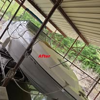 After photo of detailed boat exterior beside dock structure