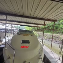 After photo of polished boat bow beneath covered dock